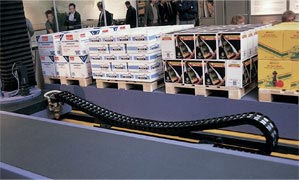 Unsupported cable carrier with sag